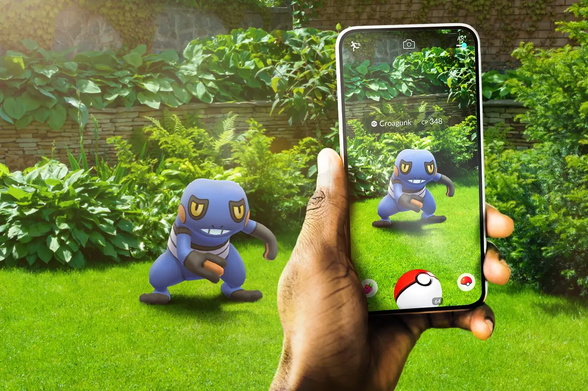 Catching a Pokémon in AR on a phone in Pokémon GO