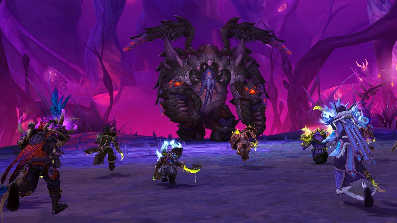 Patch 12.1.5 key art: a raid group charging a giant insectoid boss